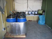 Experimental set-up for the determination of energetic loss and emission potential of slurry during storage